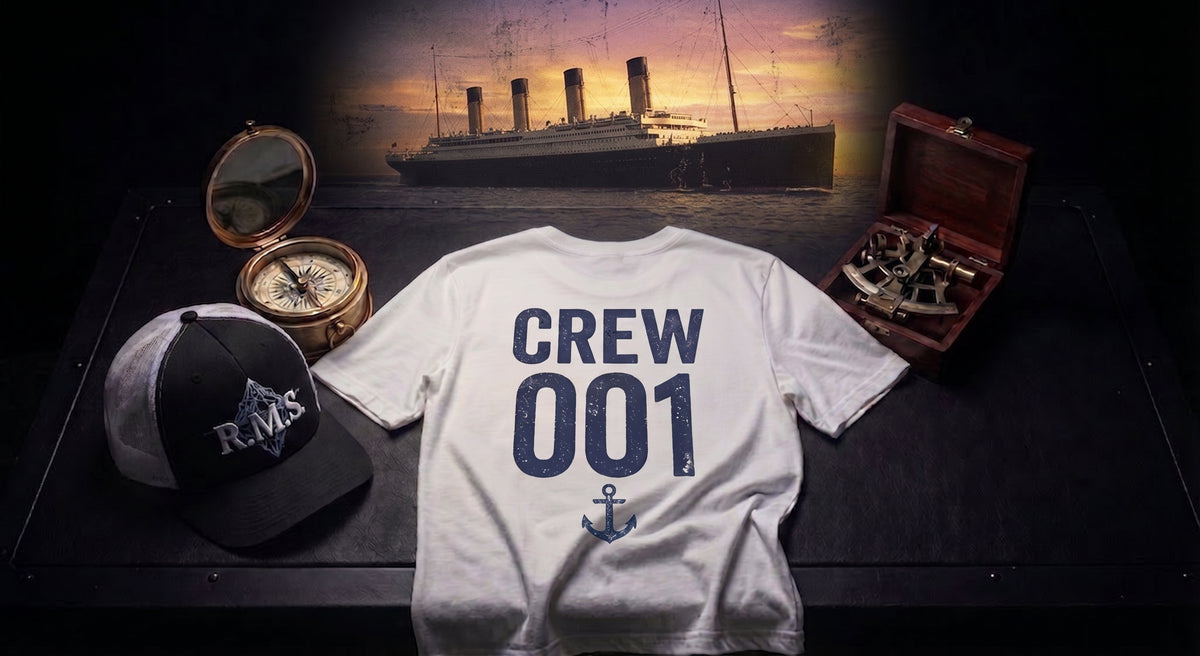 A white crew t-shirt with 'CREW 001' and an anchor graphic printed on the back, displayed alongside a black and white R.M.